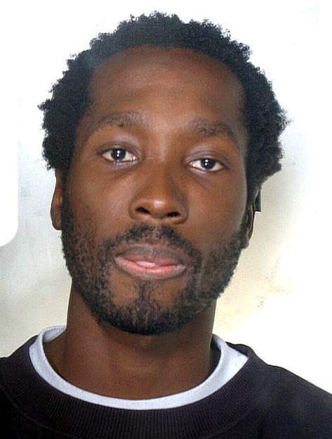 A police handout photo of Rudy Hermann Guede