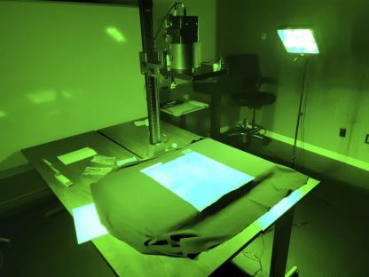 Researchers using imaging technology on a Magna Carta copy.