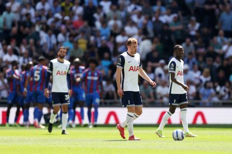 Dejan Kulusevski of Tottenham Hotspur looking dejected on the field.