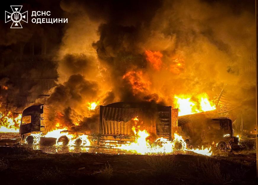 Cargo trucks burn at the site of a Russian drone strike in Odesa region, Ukraine.