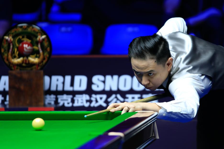 Xiao Guodong of China playing snooker.