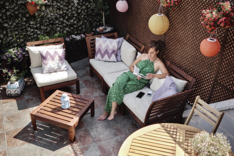 A girl is enjoying her free time in her garden
