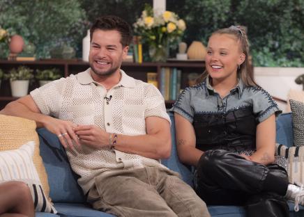 Chris Hughes and JoJo Siwa on a TV show.