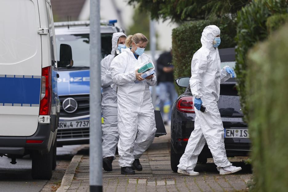 Ambulance and emergency vehicles near houses where the newly elected mayor of Herdecke was injured in a knife attack.