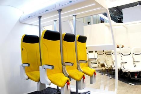 Three upright airplane seat prototypes.