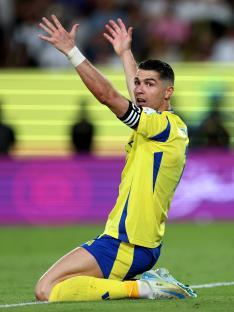 Cristiano Ronaldo of Al Nassr reacting during a soccer match.