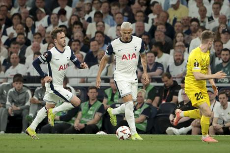 Tottenham Hotspur players Richarlison and James Maddison during a UEFA Europa League match.