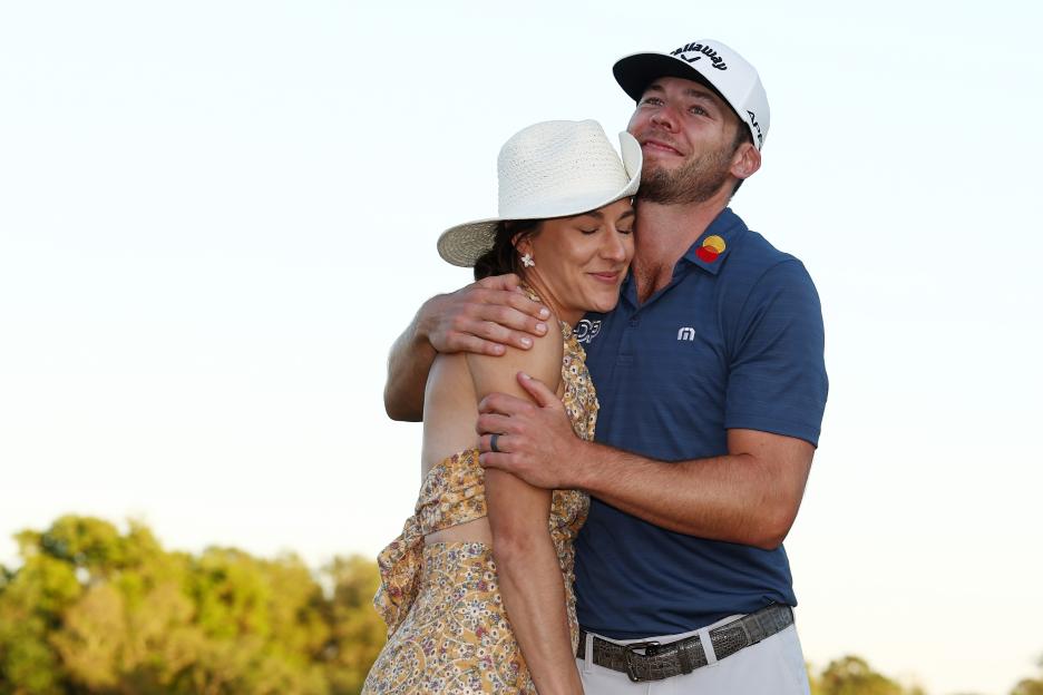 Sam Burns celebrates with his wife Caroline Campbell after defeating Davis Riley in the final round of the Valspar Championship.