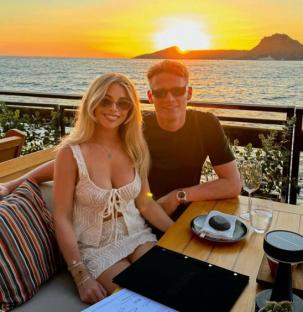 Scott McTominay and Cameron Reading at an oceanside restaurant during sunset.