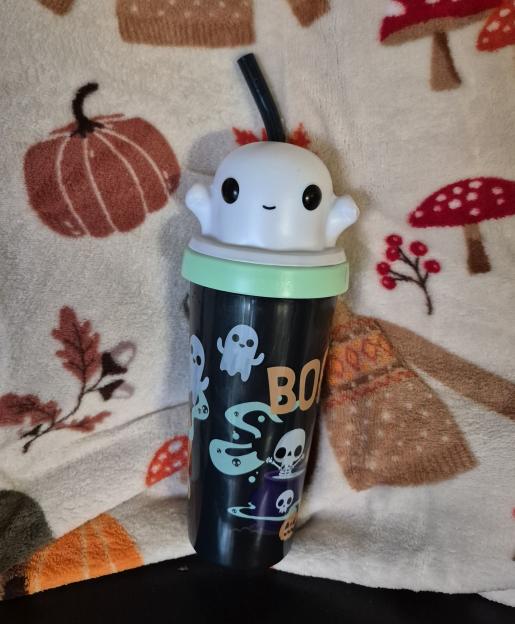 They initially thought it was an instruction leaflet stuffed inside the ghost cup