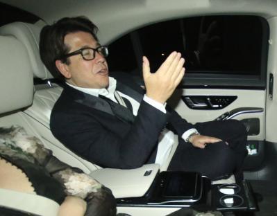 Michael McIntyre leaving a party.