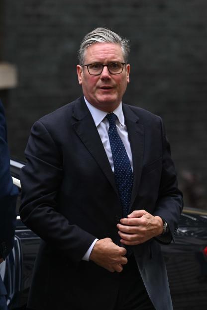 Keir Starmer giving a statement from Downing Street about a terror attack in Manchester, shown on a Sky News broadcast.