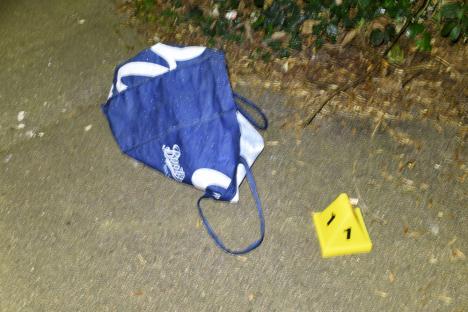 Boots bag and evidence marker where a baby was found abandoned.
