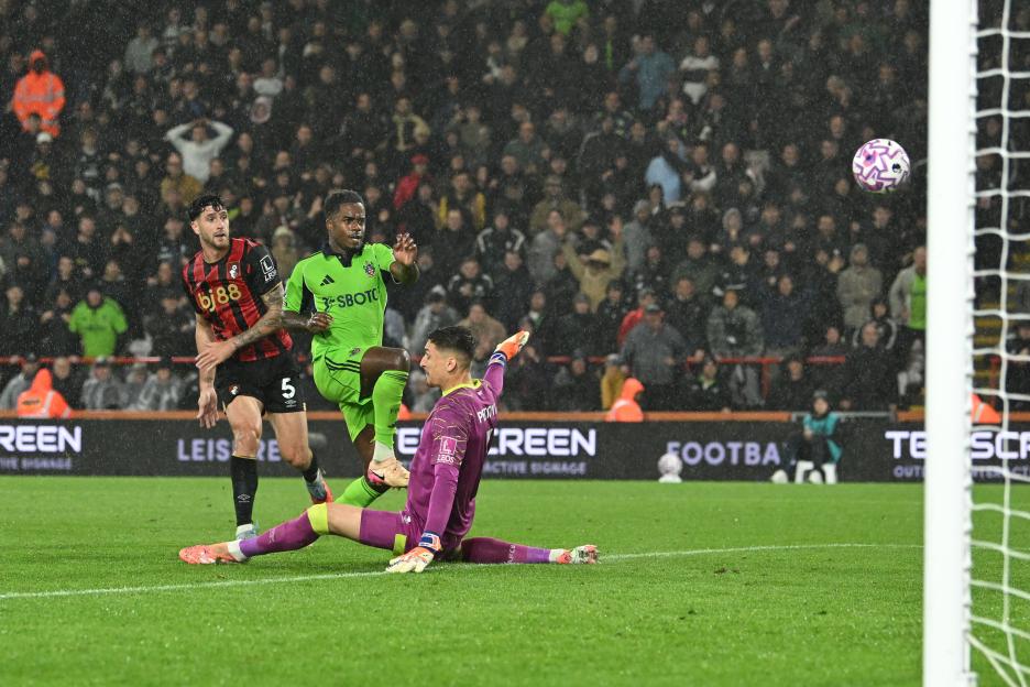 Ryan Sessegnon (30) scores the opening goal for Fulham against Djordje Petrovic (1) of AFC Bournemouth during a Premier League match.