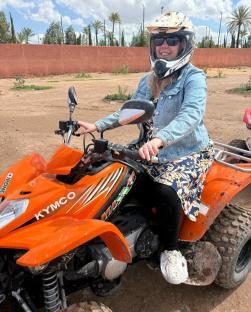 Woman on an orange ATV in Marrakesh.