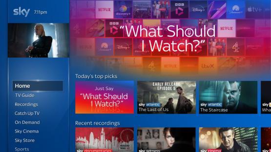 Sky TV guide interface showing available channels and programs.