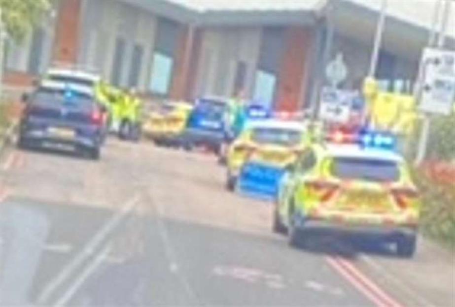 Emergency vehicles at a scene.