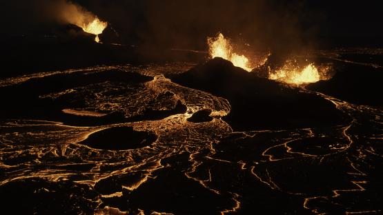 Aerial view of lava flowing from multiple craters of the SundhnÃºkur volcano in Iceland.