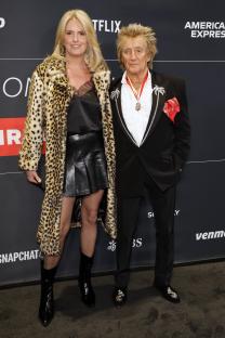 Penny Lancaster and Rod Stewart at a benefit concert.