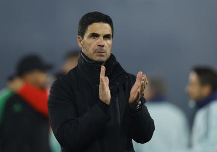Mikel Arteta, Arsenal manager, clapping.