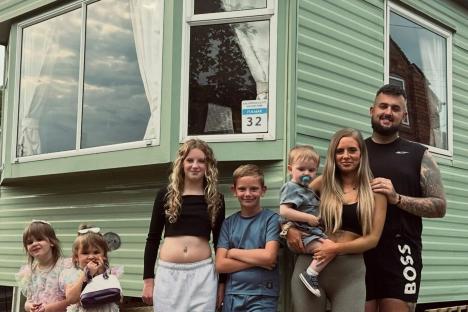 I moved my family-of-7 out of a four-bed home and into a caravan – downsizing is chaos but we save £2.7k a month