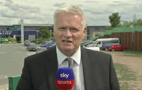 Sky Sports reporter outside Finch Farm.