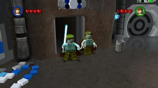 Lego Star Wars game screenshot showing Obi-Wan Kenobi and Anakin Skywalker minifigures.