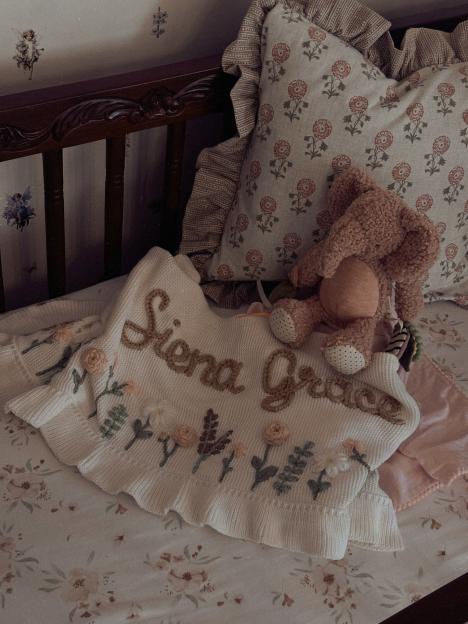 Baby blanket embroidered with "Siena Grace".