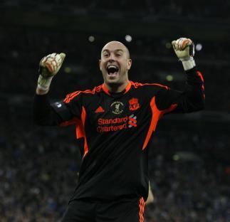 Jose Reina of Liverpool celebrating a penalty save.