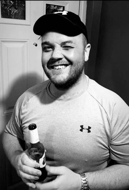 Black and white photo of Mark Anthony Kirby.