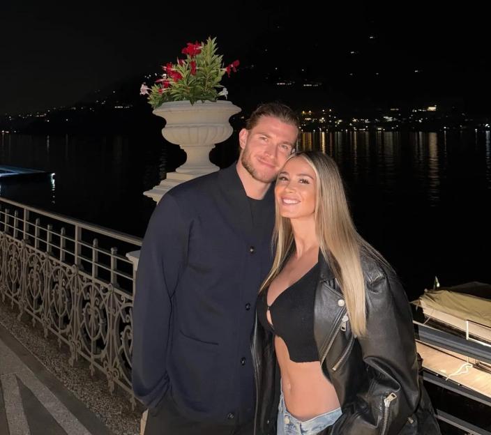 Diletta Leotta and Loris Karius on Lake Como at night.