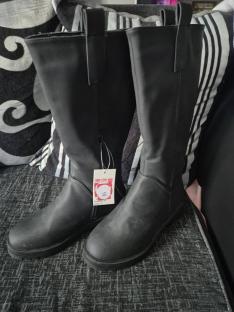 Pair of black knee-high boots.