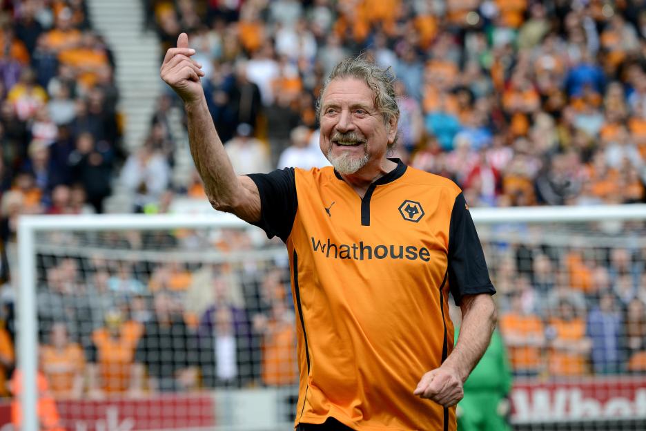 Robert Plant, former Led Zeppelin singer, at a soccer game.
