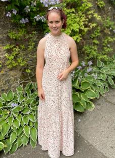 Woman in floral maxi dress.