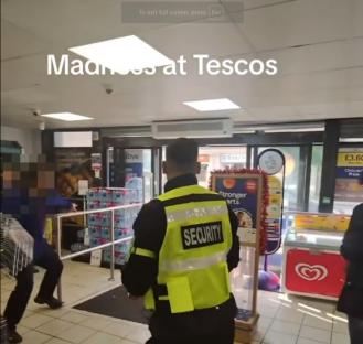 Security guard intervening in a Tesco altercation.