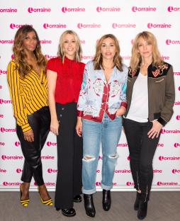 Photo of the All Saints band members at a press event.