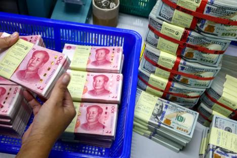 Chinese currency falls to weakest value in more than 17 years amid trade war with US