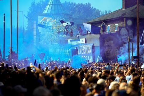 Everton fans celebrating outside Goodison Park.