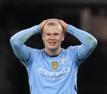 Erling Haaland of Manchester City looking dejected during a soccer match.