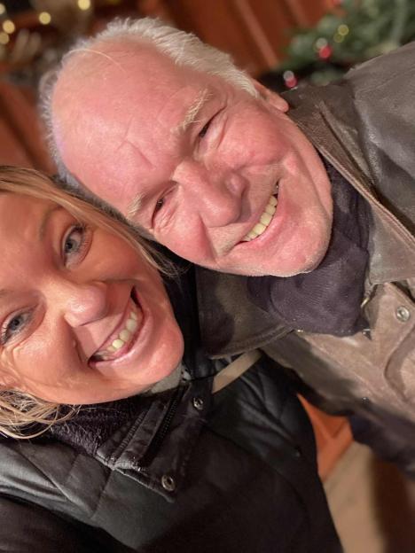 Alan Kirby and Liza Whitemore smiling for a selfie.