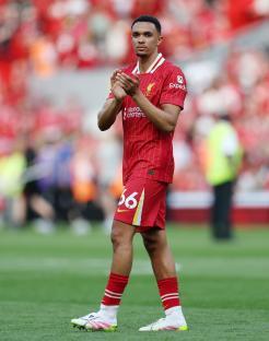 Trent Alexander-Arnold of Liverpool applauding fans.
