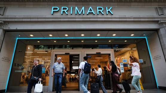 Customers entering and exiting a Primark store in London.