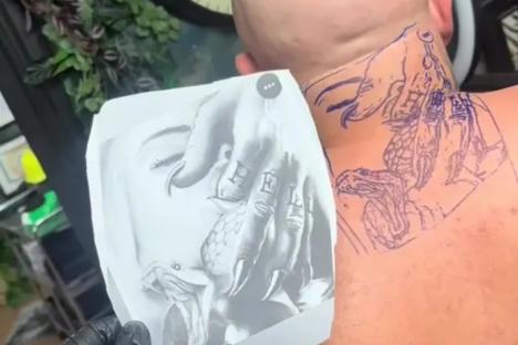 ‘Good thing he can’t see it’ people say as tattoo artist shows off inking with a detail that’s left everyone in stitches