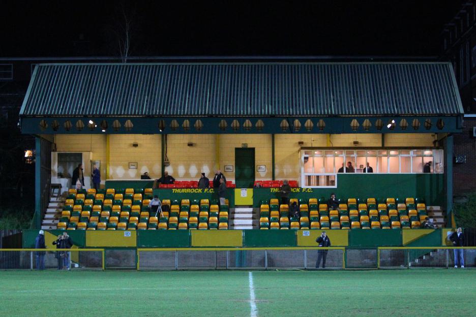 The main stand at Ship Lane during a football match between Romford and Aveley.