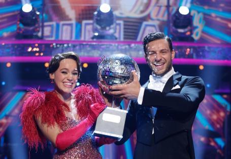 Ellie Leach and Vito Coppola, winners of Strictly Come Dancing 2023, holding the trophy.