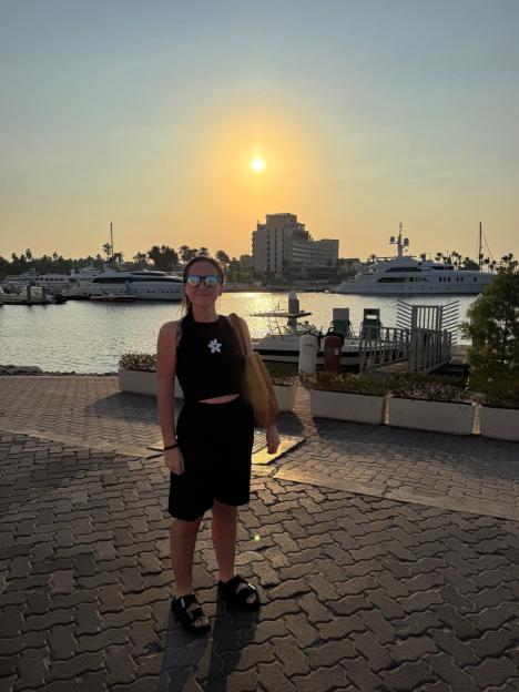 Woman in Dubai at sunset.