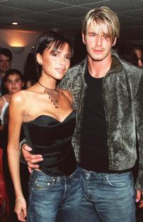 Victoria and David Beckham backstage at a Whitney Houston concert.