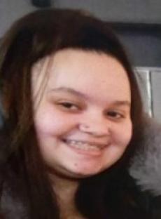 Photo of Skye smiling.