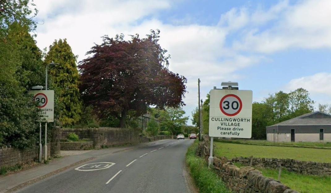 Road signs indicating the 30 mph speed limit for Cullingworth Village.
