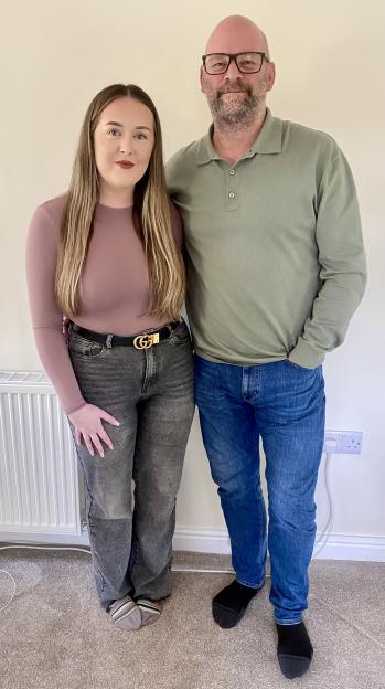 John Mitchell and Abi McMahon posing for a photo.